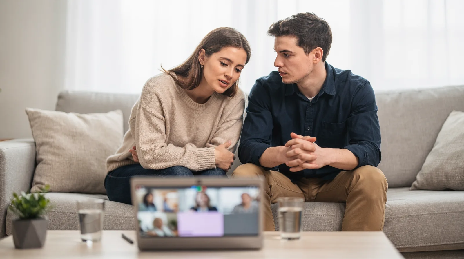 Couples communicate with their therapist through secure messaging and live video sessions during online counselling
